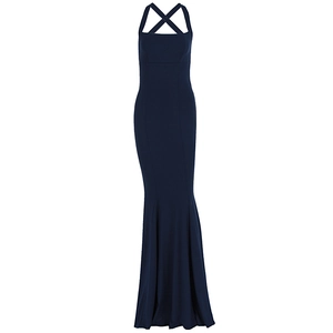 Detail of navy blue halter neck maxi dress featuring a slim fit mermaid hemline