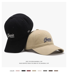 Detail of classic cotton baseball caps with refined Cherie letter embroidery on front