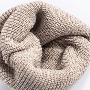 Knit beanie hat in beige ribbed fabric, trendy docker cap style for winter fashion