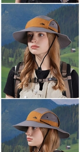 Outdoor sun hat with wide brim, waterproof fabric, mountain logo detail and adjustable chin cord