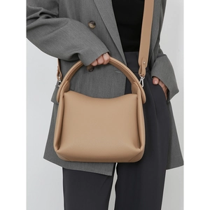 Minimalist khaki large capacity pillow bag with adjustable strap for commuting