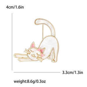 Cute white enamel cat brooch in a stretching pose with gold metal edges and dimensions
