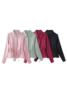 Detailed view of satin long-sleeve shirts in four colors with adjustable waist ties