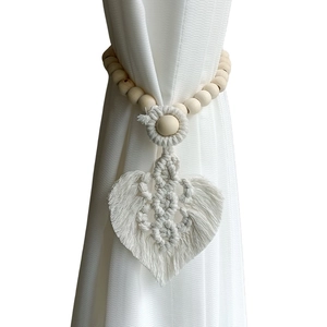 Bohemian handmade macrame curtain tieback with wooden beads and woven leaf design