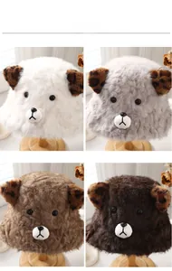 Detail of furry bucket hats with leopard print ears in white gray and camel colors