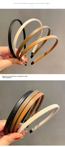 Detail view of multi-colored faux leather headbands featuring elegant lychee grain texture