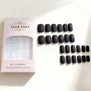 Matte black short square press-on nails set with 24 pieces in a pink window box