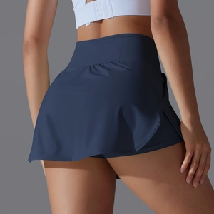 Rear view of high-waisted navy blue tennis skirt with built-in liner and back pocket
