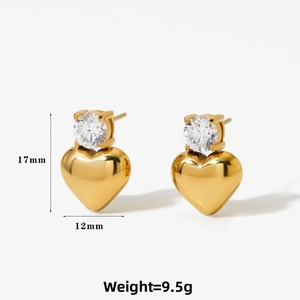 Detail view of heart-shaped gold stud earrings showing 17mm height and 12mm width specs