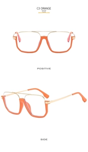 Detail view of large orange square frames with gold metal temples in C3 colorway