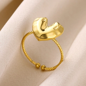 Minimalist gold heart-shaped open ring featuring a twisted band design and glossy finish