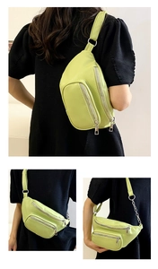Multiple views of light green PU leather chest bag with silver chain and dual compartments