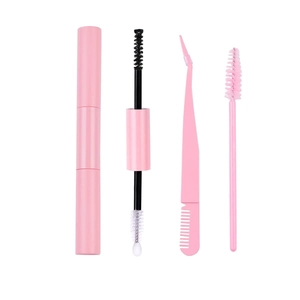 Pink 4-piece lash and brow tool set with spoolie brushes and tweezers on white background