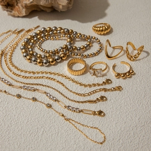 Collection of 18K gold and silver plated stainless steel necklaces, bracelets, and rings