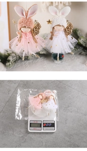 Detailed view of lightweight bunny angel ornaments weighing 19g with golden wings
