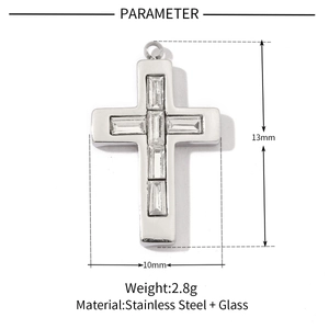 Detail of stainless steel cross pendant with glass stones showing 13mm by 10mm dimensions
