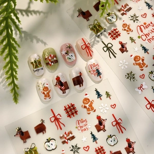Christmas nail art stickers featuring gingerbread man, dachshund, and festive patterns