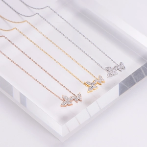 Sparkling butterfly pendant necklace in gold, silver and rose gold with zircon stones