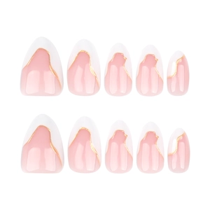 Short almond press-on nails featuring white French tips and gold glitter sand accents