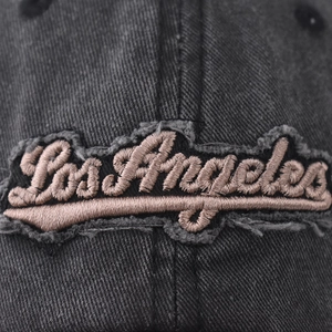 Washed black Los Angeles embroidered baseball cap with vintage distressed denim texture