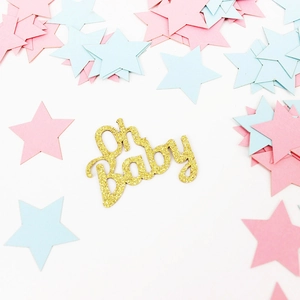 Glittering Oh Baby confetti with pink and blue stars for baby shower party decor