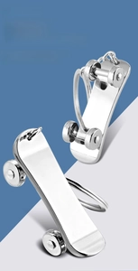 Polished zinc alloy skateboard keychain detail showing custom laser logo engraving