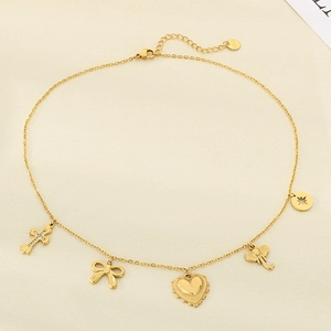 Gold stainless steel multi-pendant necklace featuring cross, bow, heart and elephant charms