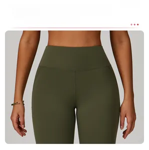 Detail of high-waist yoga pants with T-shaped stitching for tummy control in olive green