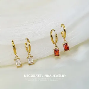 Gold rectangular zircon hoop earrings set in clear white and deep red stones