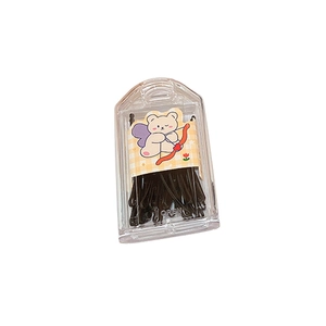 Minimalist black bobby pins set in a portable transparent cartoon bear storage case