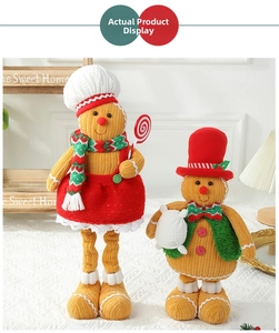 Macro detail of gingerbread dolls with knitted texture and festive Christmas outfits