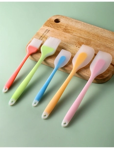 5-piece colorful silicone spatula and brush set arranged on a wooden board