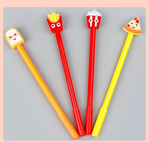Detailed view of four food-themed pens with silicone bread, fries, and pizza toppers