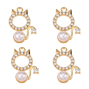 Detail of four gold cat-shaped pendants with white pearls and sparkling zircons