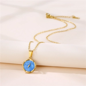 Gold stainless steel necklace with blue marble pendant and gold lightning bolt symbol