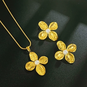 French vintage gold four-leaf clover jewelry set with pearls on necklace and earrings