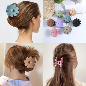 Floral hair claw clips in multiple colors for women shown in model hair and flat lay view