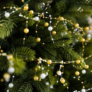 Elegant white and gold crystal bead chain garland for festive Christmas tree decoration