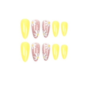 Faux ongles amande courts jaunes avec motifs de marguerites blanches en kit