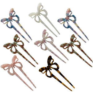 Set of 8 elegant butterfly acetate hair sticks in tortoiseshell and marble patterns