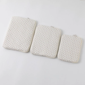 Three quilted floral laptop sleeves in different sizes with zipper closure and padding