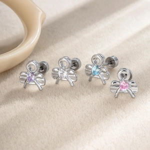 Bowknot cartilage studs set with heart zircon in purple, white, blue and pink