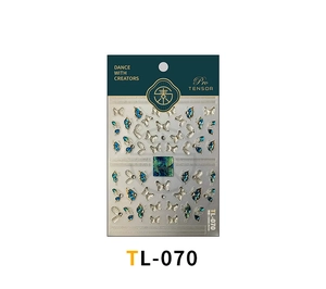 Detailed view of 5D embossed butterfly nail stickers with blue accents in retail packaging