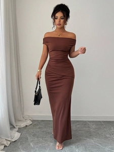 Detail of off-shoulder neckline and side ruching on a chocolate brown evening dress