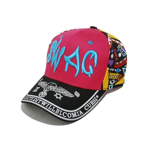Detail of street-style baseball cap with SWAG embroidery and graffiti brim patterns