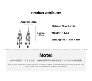 Detailed view of Gothic black waterdrop fringe earrings with 11.5cm length measurements