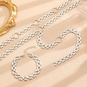 Close-up of silver rectangular tank chain link bracelet with adjustable lobster clasp