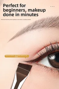 Macro shot of thin angled eyeliner brush creating a precise line on the eyelid