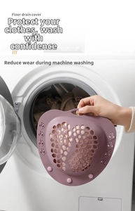 Detail view of purple silicone laundry bag for bras with heart-shaped drainage holes