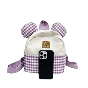 Children's purple plaid canvas backpack with 3D ears and Sunday logo, size compared to phone
